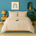 Housse de couette zippée facile à mettre en percale de coton DOHA sur lit moderne avec décor intérieur stylé.