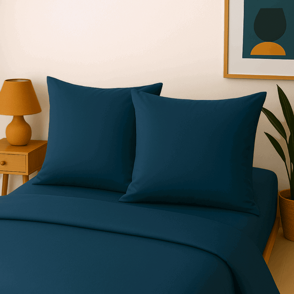 Taies d'oreiller en percale 80 unie ATLANTIS en couleur notché.
